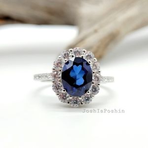 Sterling silver blue sapphire halo ring
